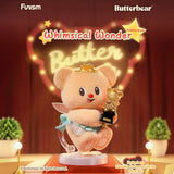 Fluffy bear figurine wearing crown and cape holding golden bear trophy on illuminated stage with red curtains background