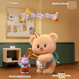 Butterbear blind box figure: plush bear holding a golden key with a small companion