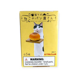 A yellow box shows the Cat Bakery Waiter holding a bread tray. Kitan Club's blind box includes Japanese and English text warning of a choking hazard from small parts, adding an element of surprise to this delightful experience.