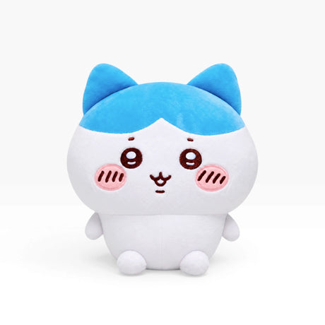 Small plush toy with blue ears, white face, and rosy paw pads