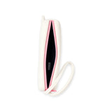 Plush zipper case open view showing dark interior and pink zipper, cream