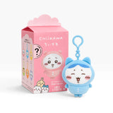 Chiikawa pyjama plush keychain with blue character design, shown with pink blind box