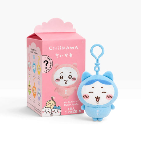 Chiikawa pyjama plush keychain with blue character design, shown with pink blind box