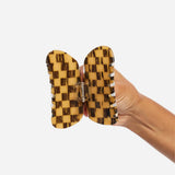 Mocha checker claw clip, side view, long prongs and metal hinge