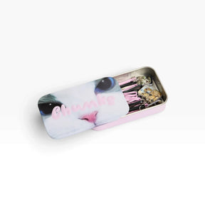 Cat-themed bobby pin tin with pins laid inside, featuring pink striped clips