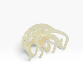 Pearl shimmer octopus-claw hair clip, large scalloped claw shape, iridescent finish