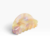 Pastel translucent acrylic claw clip with curved teeth, iridescent finish
