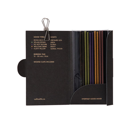 Opened black Collins Natural incense set box showing five different colored sticks with scent and mood details inside flap