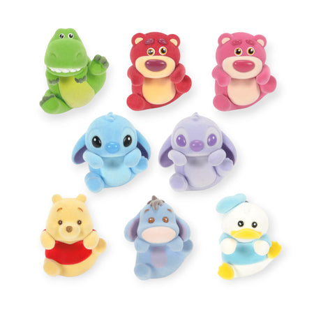 Eight small colorful plush characters including a crocodile, two bears, two stitch-like figures, a yellow bear, a donkey, and a duck.