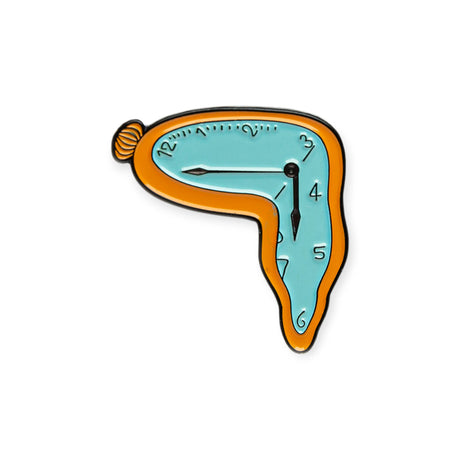 Close-up of Dali Persistence of Memory enamel pin with melting clock design on white background, gallery image 1.webp