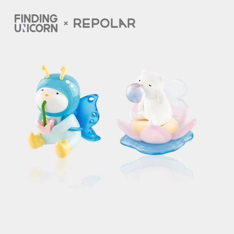 Two whimsical Finding Unicorn REPOLAR Magical Garden figures with insect and flower motifs on white background