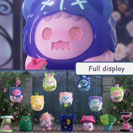 Close-up of shiny purple ShinWoo Secret Bear figure with glitter eyes above full collection of colorful Secret Bear Garden blind box figures displayed outdoors