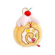 Round yellow plush zip pouch with smiling face embroidery, white frosting, and cherry keyring