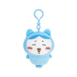 Light blue Chiikawa pyjama plush keychain with closed-eye face and hanging clip