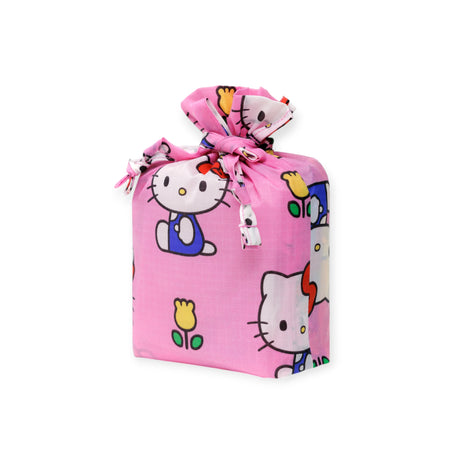 The Baggu Standard Baggu x Hello Kitty - Set of 3 features pink fabric bags with Hello Kitty and yellow tulip prints—these limited edition Sanrio totes are ideal reusable bags for fans and collectors.
