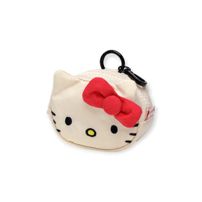 The Baggu Hello Kitty x Baggu Bag Charm is a cute coin pouch shaped like Hello Kitty’s face, with a red bow, zipper closure, and black clip—perfect for fans of adorable Hello Kitty accessories.