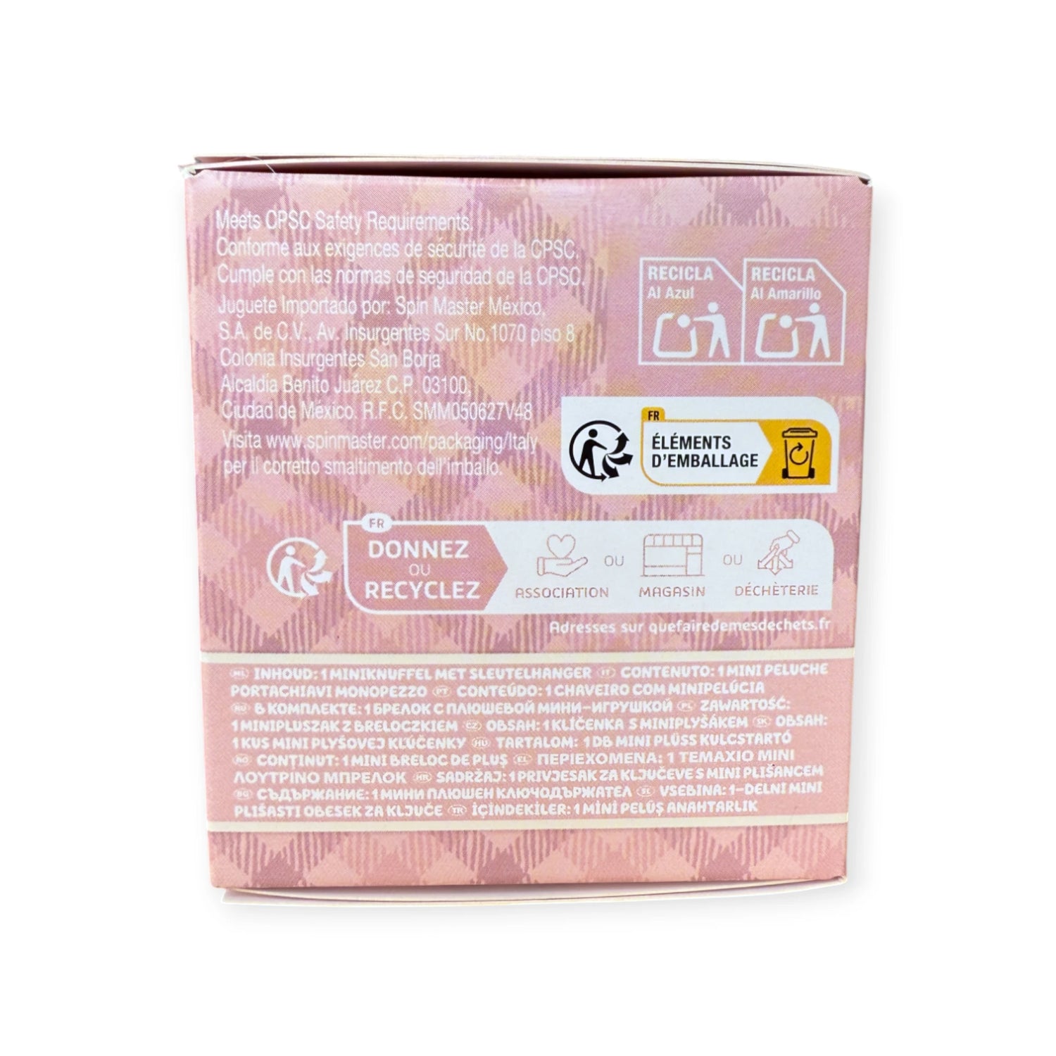 Back of a pink Hello Kitty Blind Box - Cafe Plush Keychain box shows recycling instructions, safety info in multiple languages, and various recycling symbols. Brand: Hello Kitty.