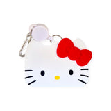 The Hello Kitty Card Pass Case is a silicone keychain with a white base, black eyes and whiskers, a yellow nose, and a red bow. It includes a metal clip and retractable badge holder.