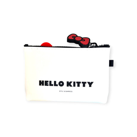 The Hello Kitty Zip Case - White for Sanrio fans boasts a sleek black zipper with "HELLO KITTY" in bold black letters and is adorned with Hello Kitty’s iconic red bow charm, making it the perfect accessory for enthusiasts.