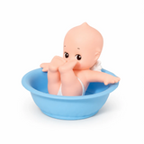 Kewpie baby figure in blue bowl, nude baby pose with arms out