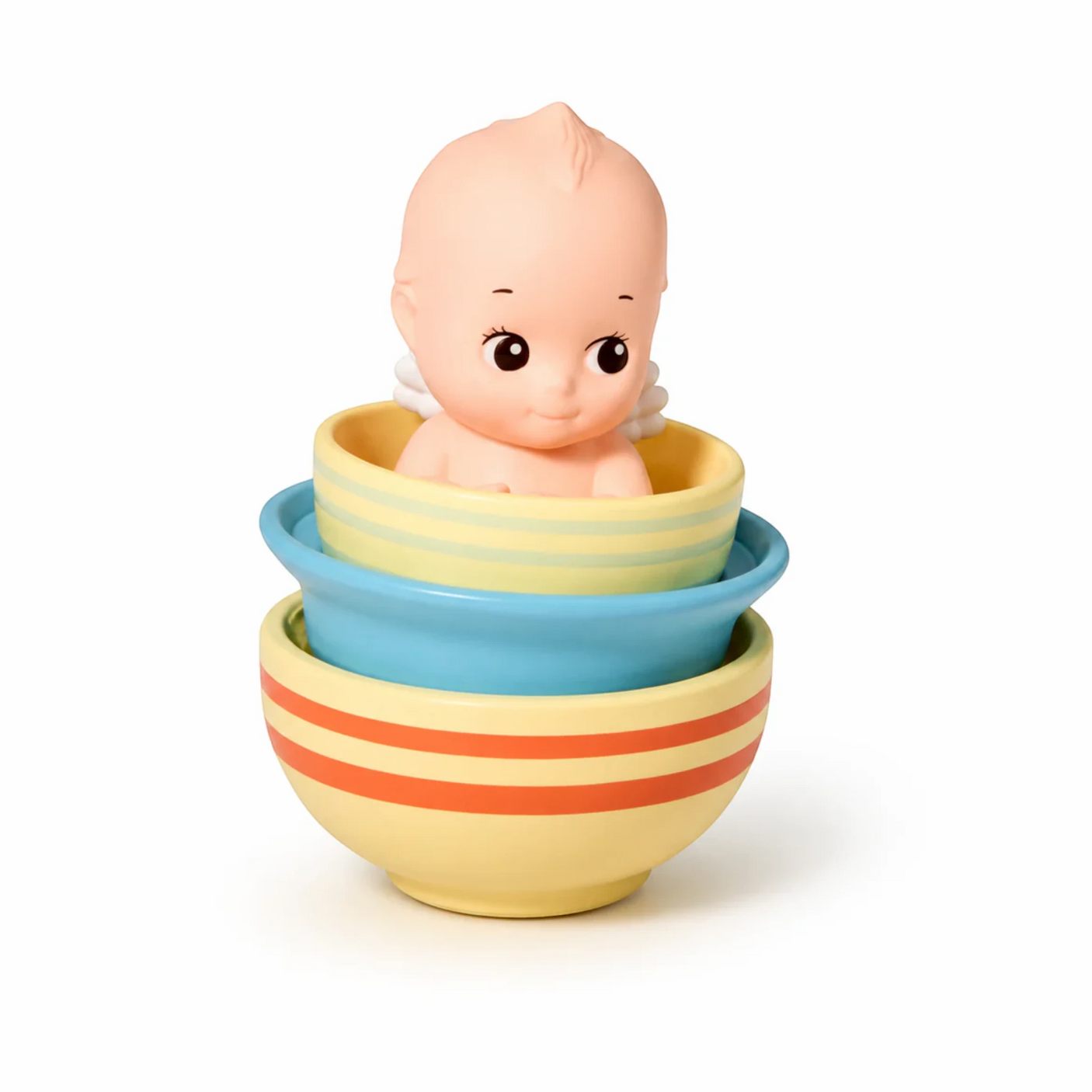 Kewpie baby figure in striped cup, pastel blue and yellow bowls