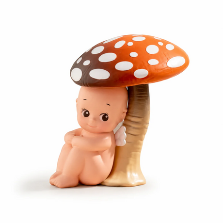 Kewpie blind box figure standing with a red polka-dot mushroom hat and tan body