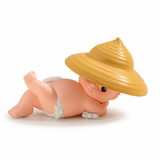 Kewpie blind box figure lying down with wide yellow hat and white shorts