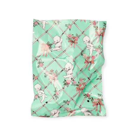 Mint fabric square with cartoon baby figures and pink floral vine lattice pattern