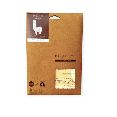 Ki-Gu-Mi Wooden Alpaca Puzzle packaging in brown cardboard with product label and window showing puzzle pieces