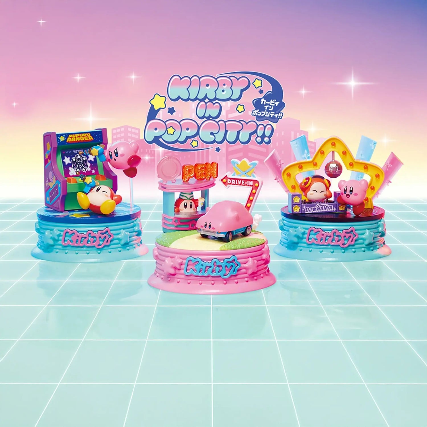 Three Kirby-themed displays, featuring the Kirby in Pop City Blind Box by Kirby and a Pop City diorama, are set on pastel platforms with a retro grid backdrop and a "Kirby in Pop Citi!!" sign overhead.
