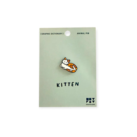Kitten enamel pin on light green backing card with orange cartoon cat