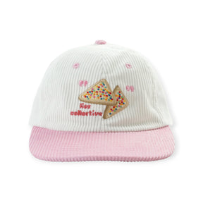 White and pink corduroy cap with fairy bread graphic patch on front