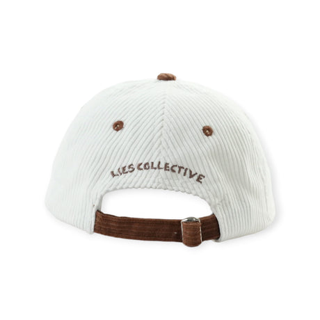 Back view of off-white corduroy cap with brown adjustable strap and embroidered Lies Collective logo above opening