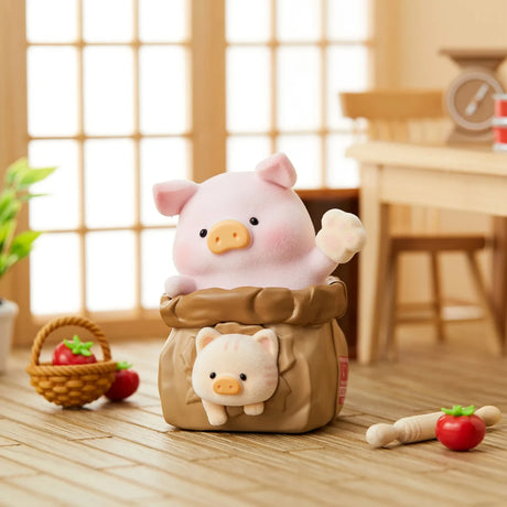 LuLu the Piggy figurine popping out of a sack with pig and vegetable toys on wooden floor in cozy room
