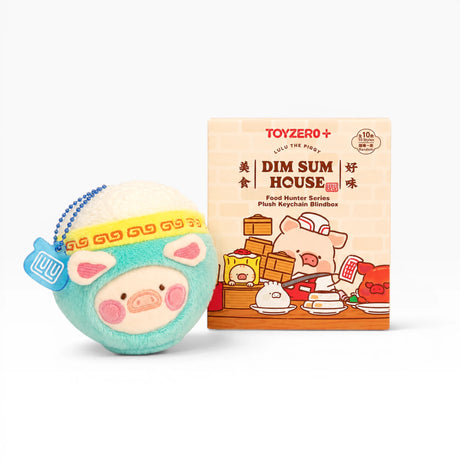 Plush keychain bun with turquoise body and Dim Sum House blind box package