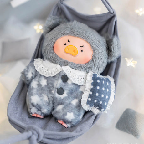 Cute LuLu Piggy plush keychain in fluffy gray star-patterned pajamas with lace collar holding a polka dot pillow in mini hammock