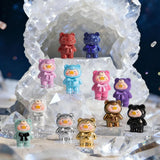 LuLu The Piggy - Mini Teddy Ore Series Blind Bag showing twelve Mini Teddy figures in metallic, pastel, and stone-inspired finishes by LuLu The Piggy