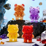 LuLu The Piggy - Mini Teddy Ore Series Blind Bag featuring four translucent Mini Teddy figures in amber, yellow, red, and purple by LuLu The Piggy