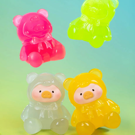 Four colorful, translucent LuLu The Piggy - Mini Teddy Blind Bag collectible figures are arranged on a gradient blue and green background.