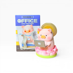 Office-themed piggy blind box with seated pink pig figure and laptop