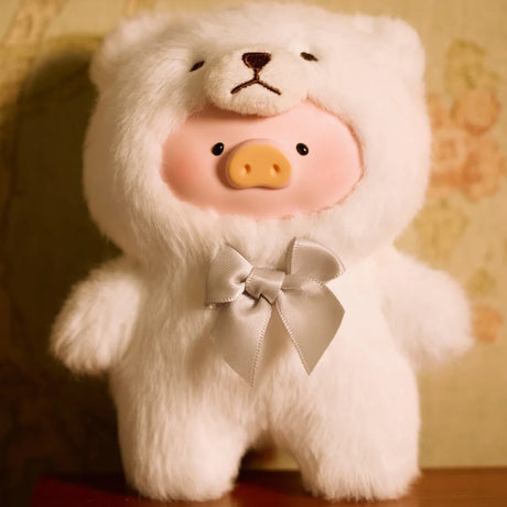 The Teddy LuLu the Piggy Plush Pal - Blind Box from LuLu The Piggy features a cute pig face in a fluffy white bear onesie with a bear hood and silver bow—perfect for collectors and plush fans!.