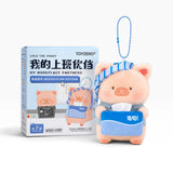 Pig plush keychain with blue striped cap and monitor pouch, with blue bead lanyard and box