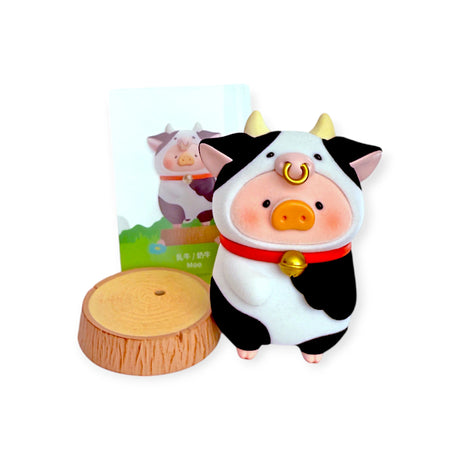 LuLu The Piggy figure in a cow costume with nose ring and bell, wooden stage and character card, Animal Party Blind Box gallery 1