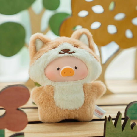 A LuLu The Piggy - Animal Party Puppet Keychain Blind Box figure with a cute pig face in a tan and white costume stands on wood, surrounded by colorful decorations—perfect for fans of LuLu The Piggy collectibles or animal party surprises.