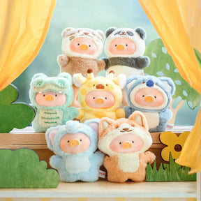 Seven LuLu The Piggy Animal Party Puppet Keychain Blind Box figures are displayed in animal costumes on a wooden surface with yellow curtains and cartoon greenery, capturing the playful spirit of this LuLu The Piggy collectible.
