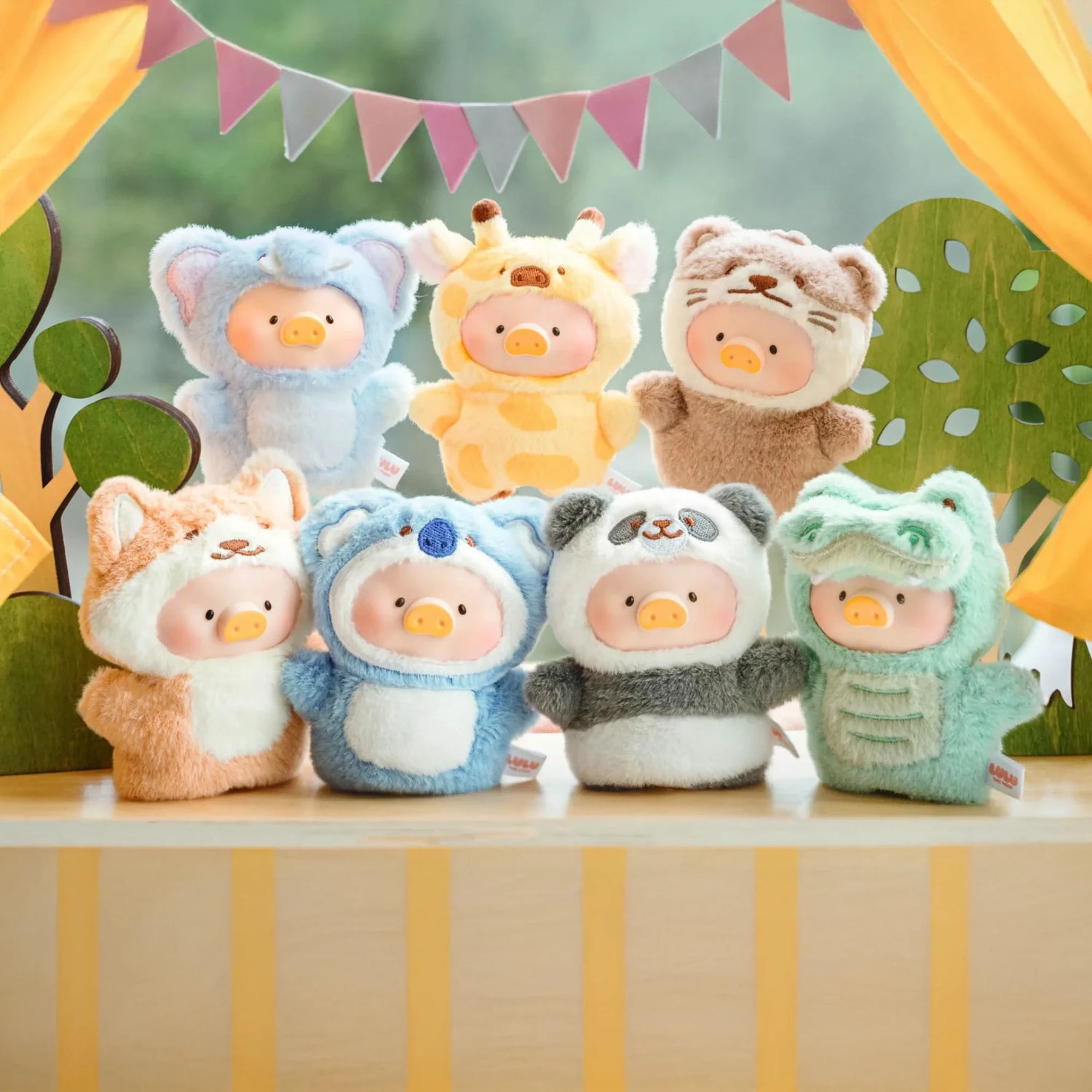 Seven LuLu The Piggy - Animal Party Puppet Keychain Blind Box figures by LuLu The Piggy wear animal costumes—elephant, giraffe, bear, fox, penguin, panda, and crocodile—displayed before a festive backdrop.