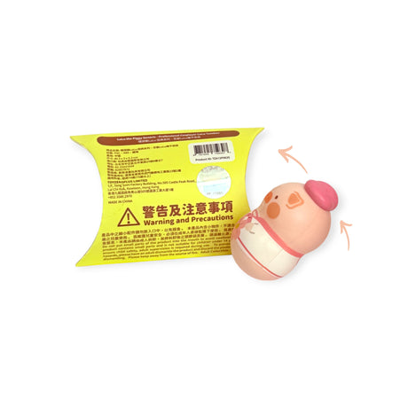 LuLu The Piggy desk wobbler blind box with cosplayer figure wearing pink beret shown wobbling, gallery position 1