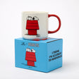 White mug with red handle, Snoopy in red jacket graphic; boxed set.