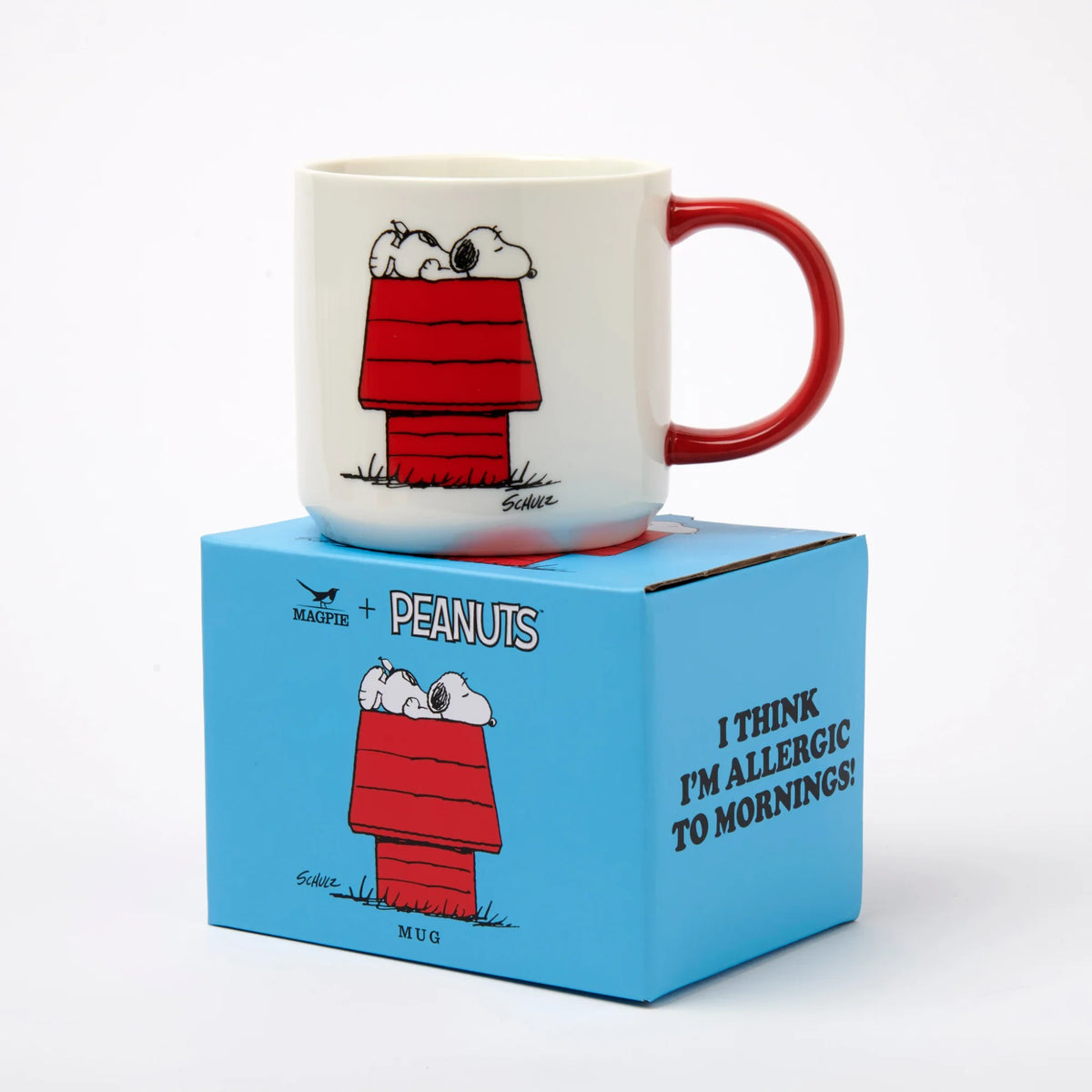 White mug with red handle, Snoopy in red jacket graphic; boxed set.