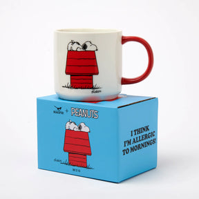 White mug with red handle, Snoopy in red jacket graphic; boxed set.